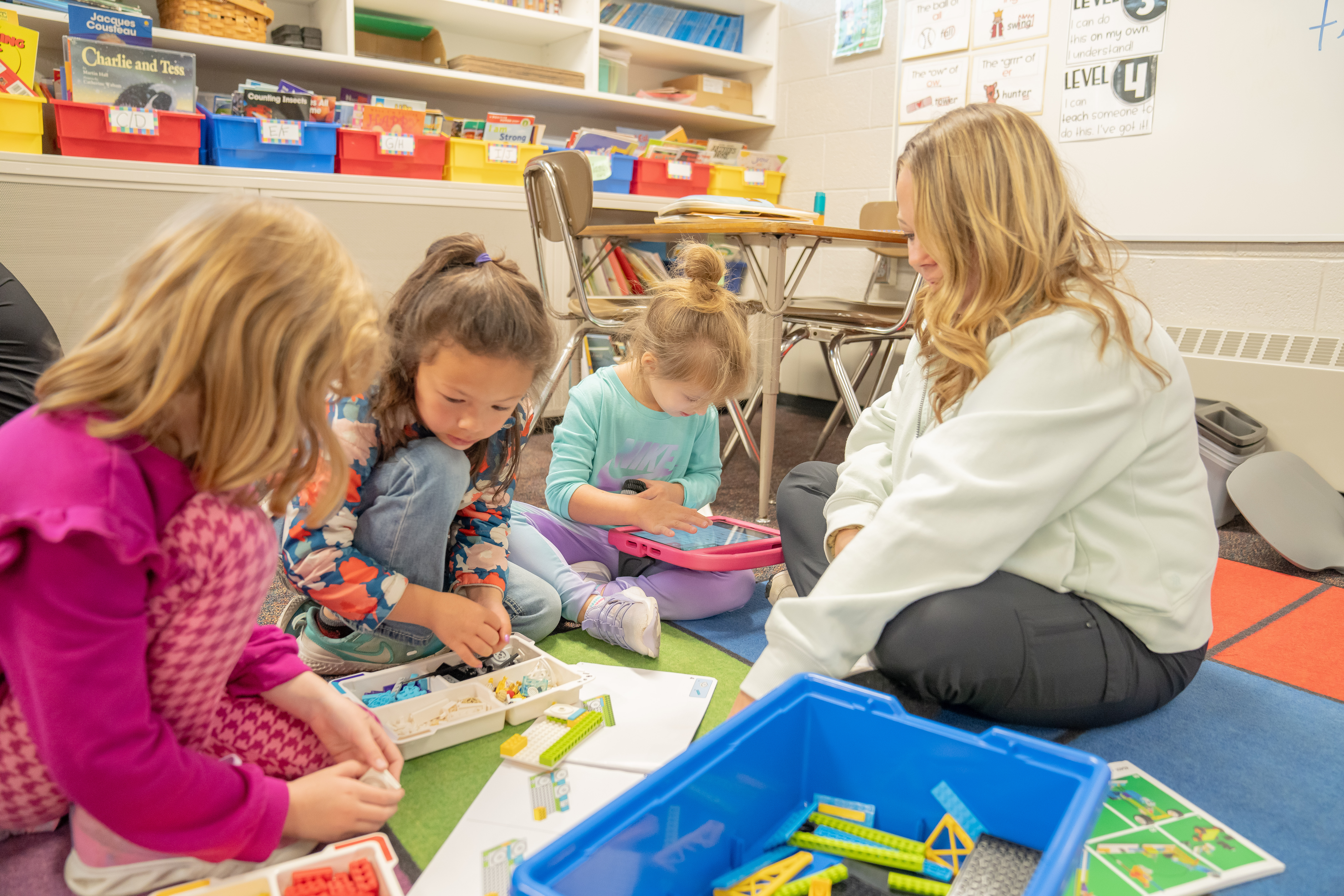 STEMbound consultant working with students